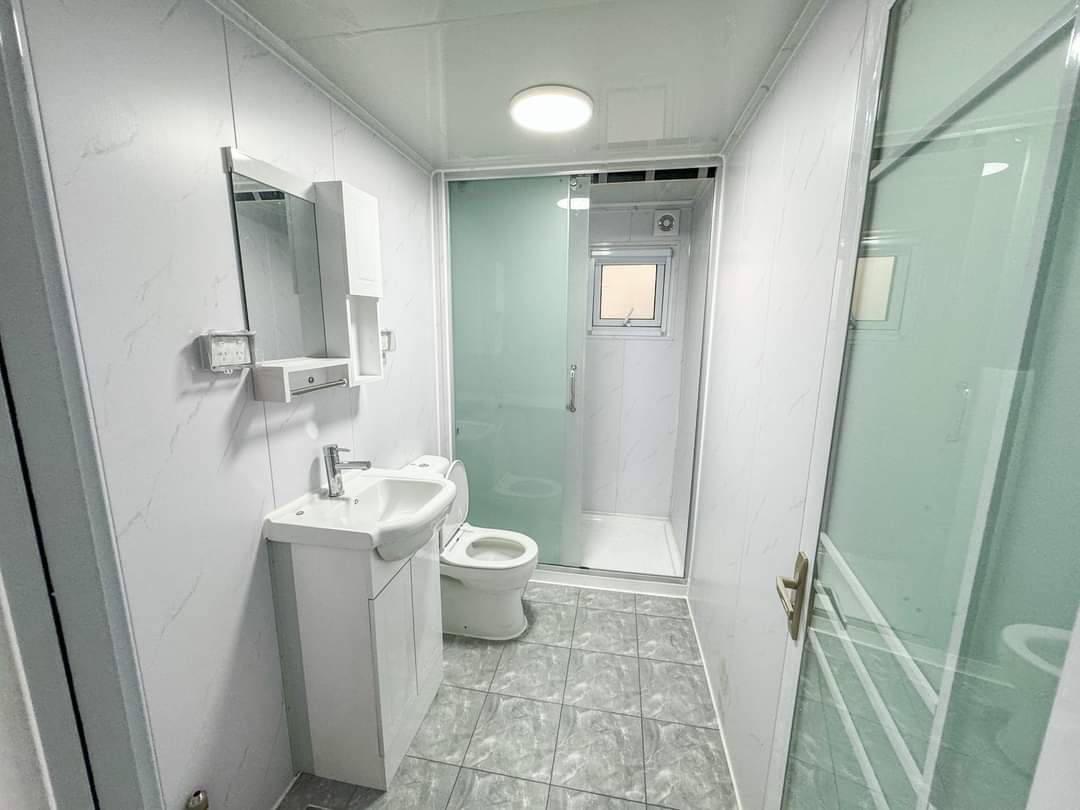 Elegant 40FT Tiny House - Portable Prefab Home with Spacious Bedrooms, Modern Bathroom, and Fully-Equipped Kitchen